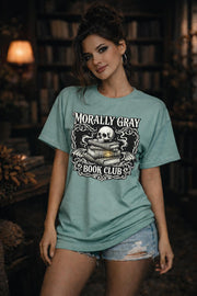 “Morally Gray Book Club” graphic tee with skull and stacked books in gothic dark academia style.