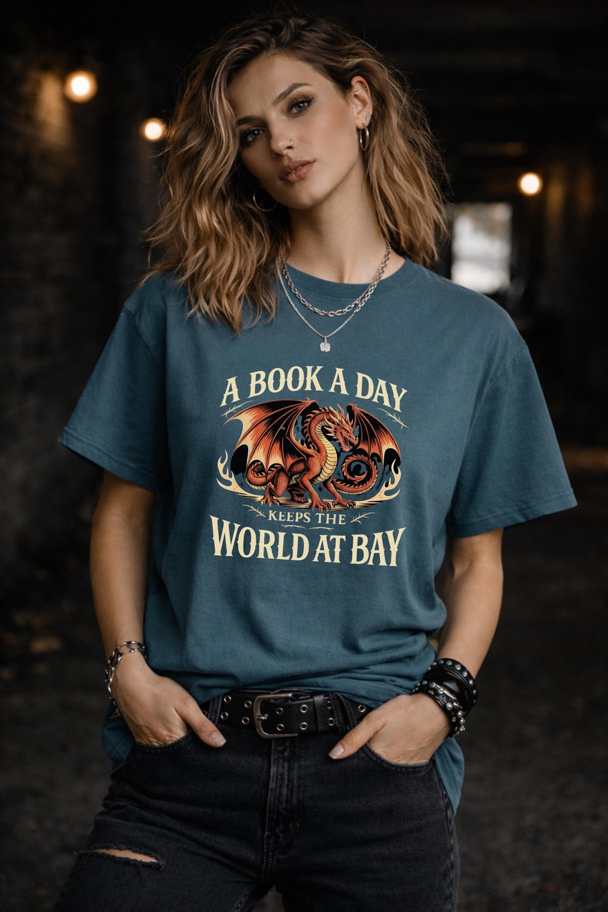 model wearing bookish graphic tee with dragon, relaxed fit reading lover apparel
