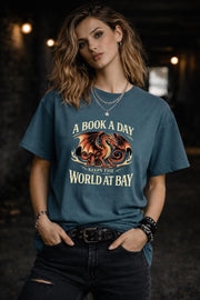 model wearing bookish graphic tee with dragon, relaxed fit reading lover apparel