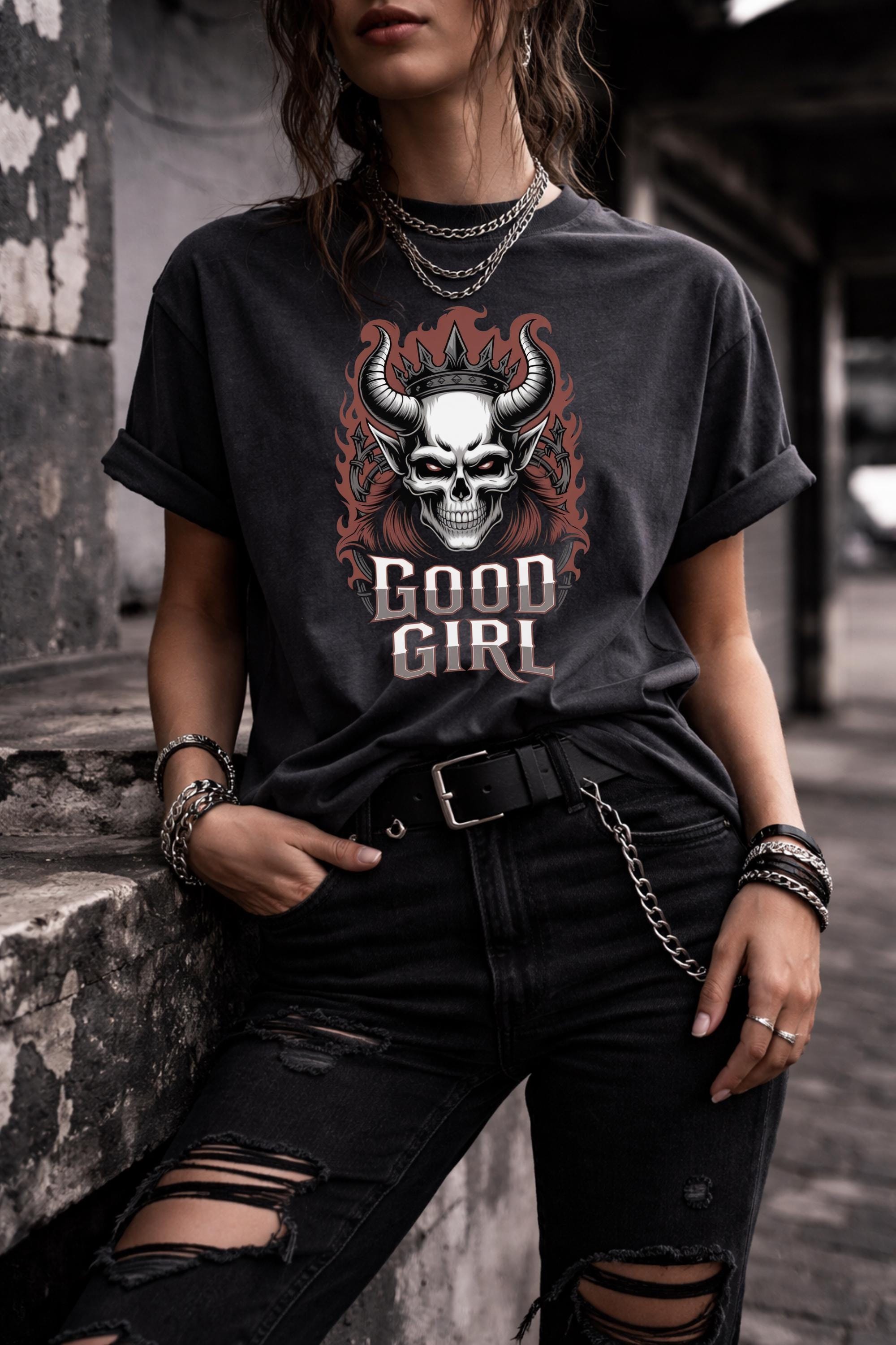 Unisex Comfort Colors t-shirt featuring gothic skull graphic with horns and crown, edgy dark aesthetic design on Pepper shirt worn by model