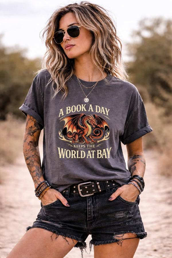 fantasy dragon shirt worn by model, book lover graphic tee with dark academia reading aesthetic