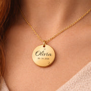 Custom engraved round pendant necklace with script name, date, and celestial star moon engraving