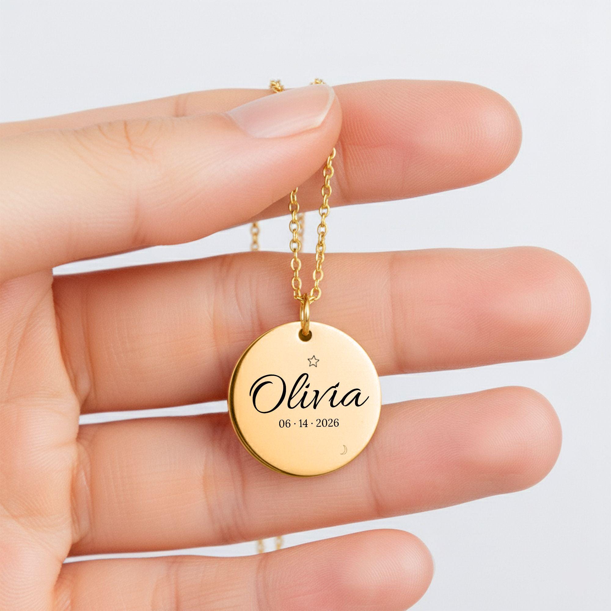 Custom engraved round pendant necklace with script name, date, and celestial star moon engraving