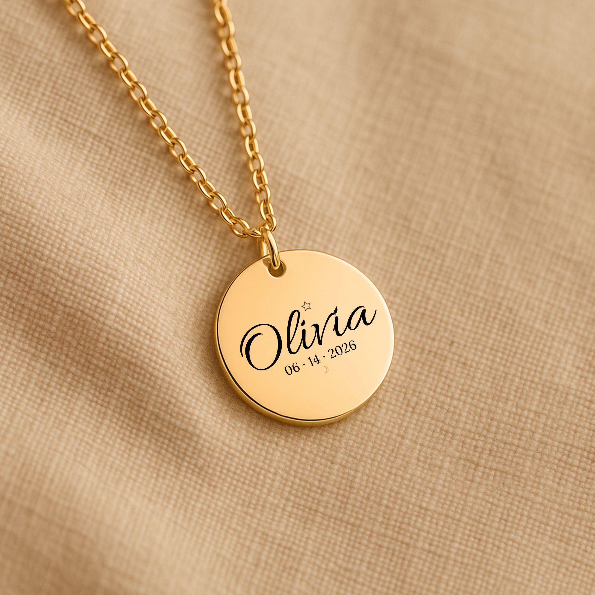 Custom engraved round pendant necklace with script name, date, and celestial star moon engraving