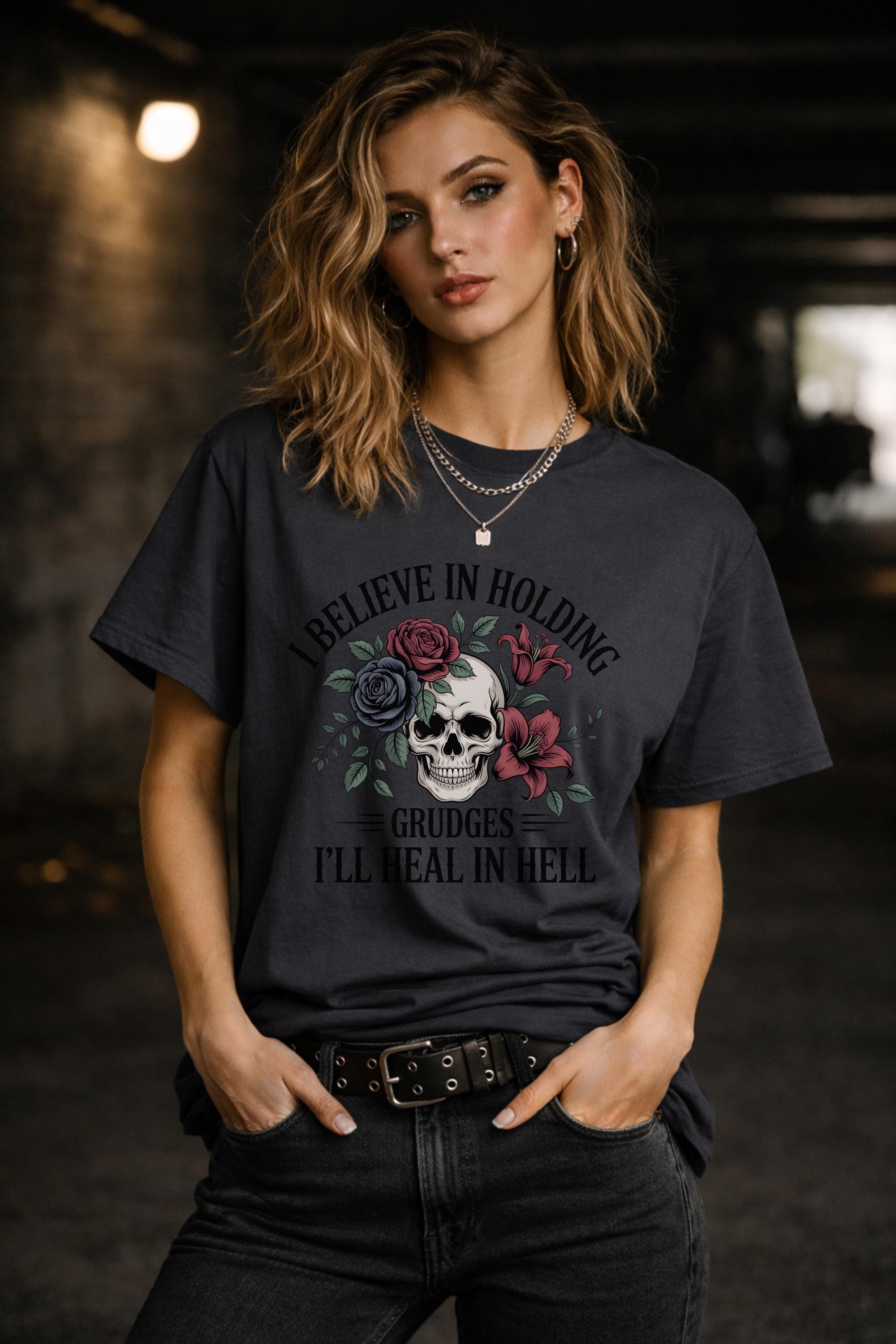 Edgy gothic skull graphic t-shirt with floral design and bold text, dark aesthetic unisex tee, emo grunge clothing style