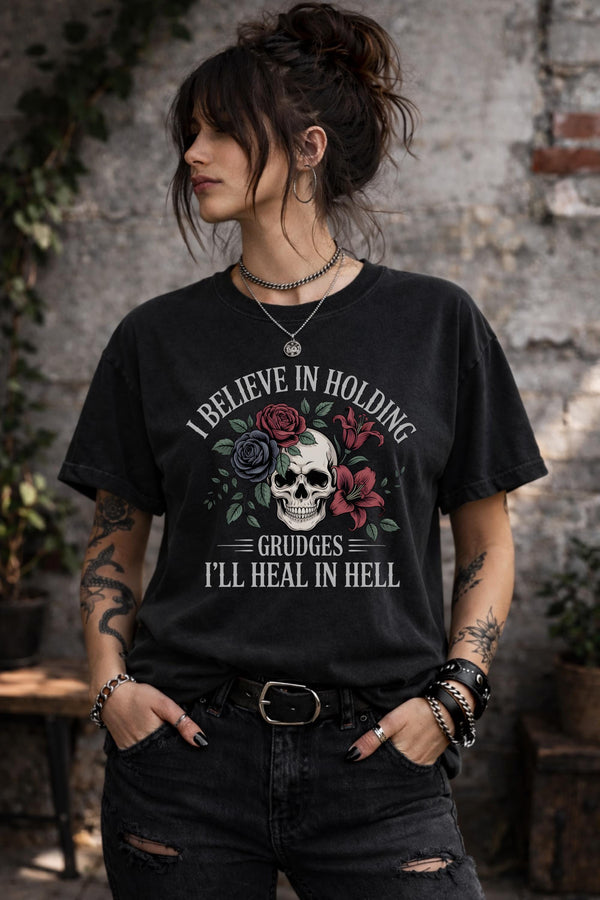 Black graphic tee featuring a skull surrounded by floral elements with a sarcastic quote in gothic style