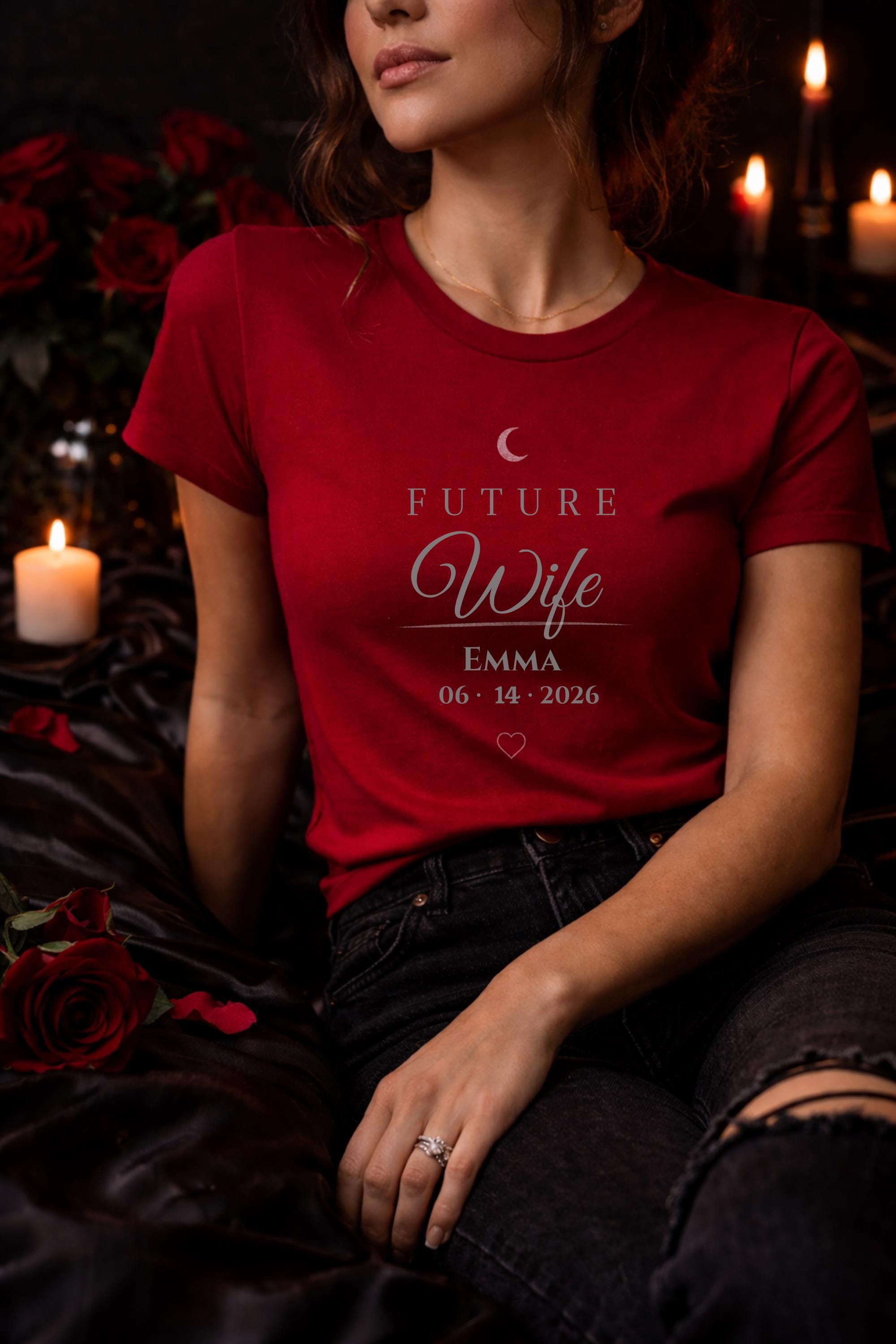 matching future husband and future wife shirts with personalized names and date worn by couple in moody dark romance style