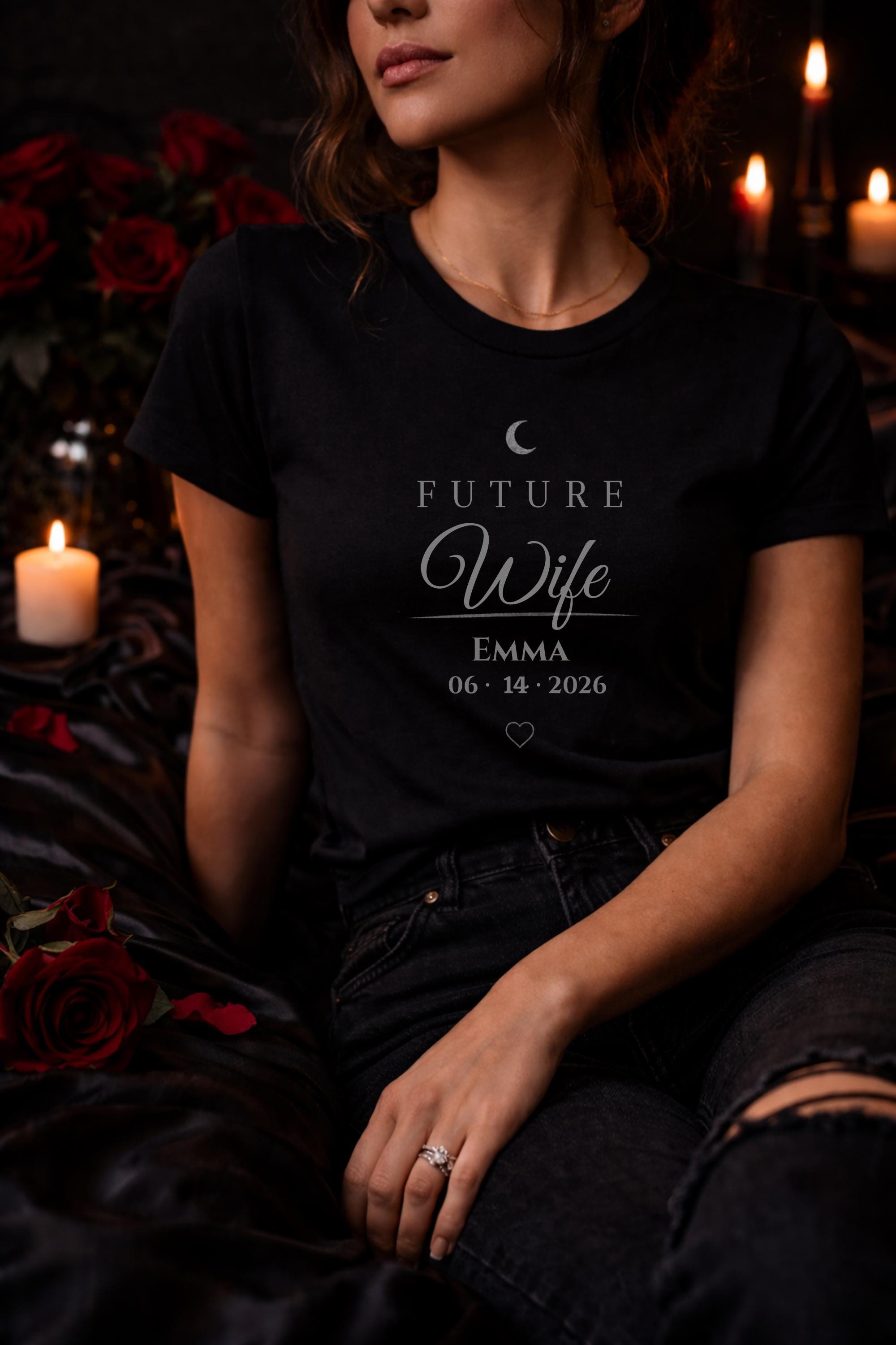 matching future husband and future wife shirts with personalized names and date worn by couple in moody dark romance style