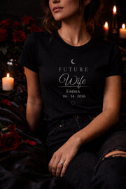 matching future husband and future wife shirts with personalized names and date worn by couple in moody dark romance style