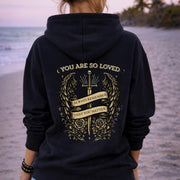 Gothic “You Are So Loved” hoodie with winged dagger and roses back design