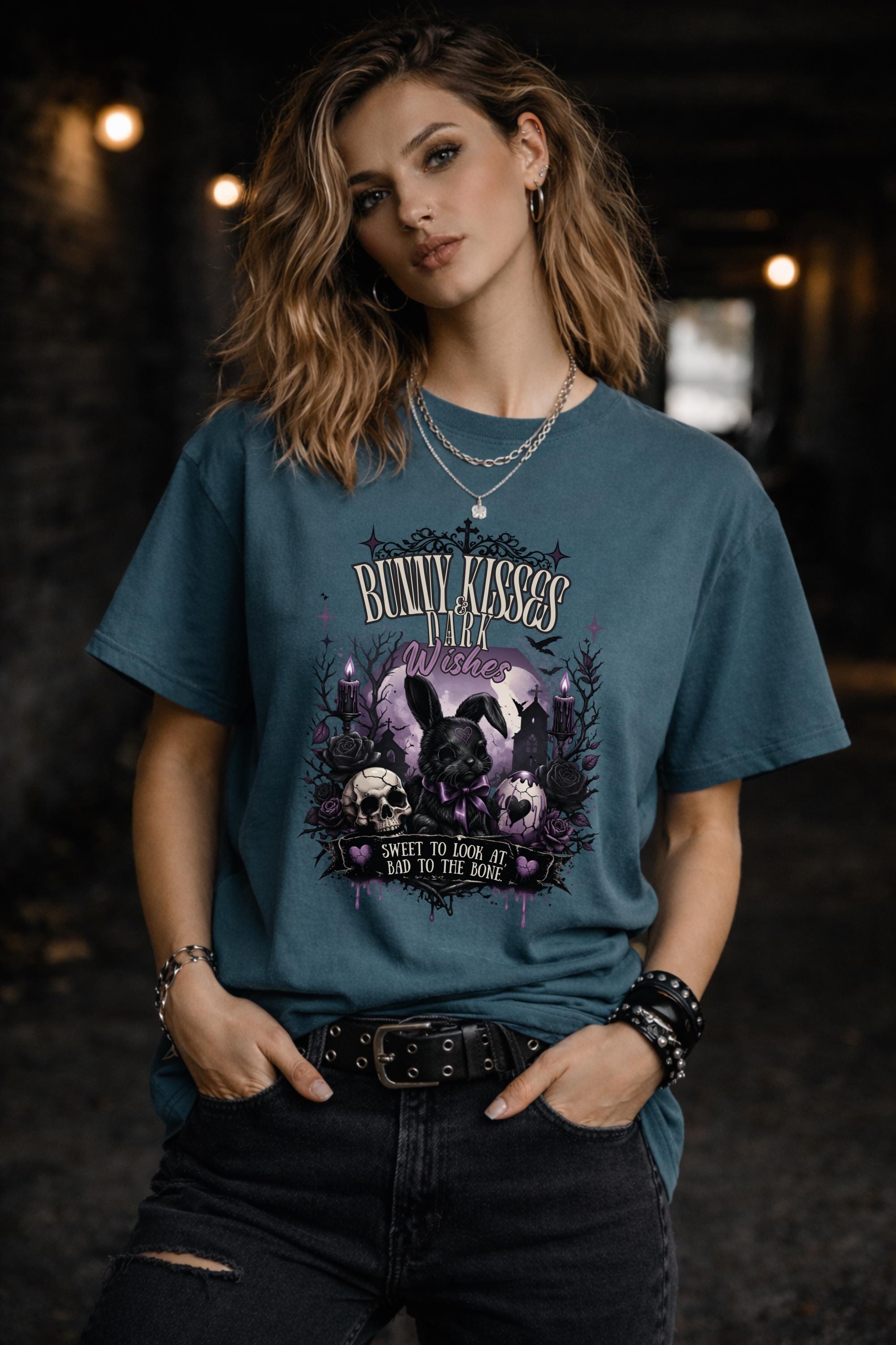 Woman wearing dark gothic bunny graphic t-shirt with text Bunny Kisses Dark Wishes Sweet To Look At Bad To The Bone styled with black jeans