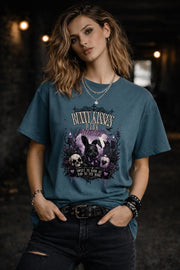 Woman wearing dark gothic bunny graphic t-shirt with text Bunny Kisses Dark Wishes Sweet To Look At Bad To The Bone styled with black jeans
