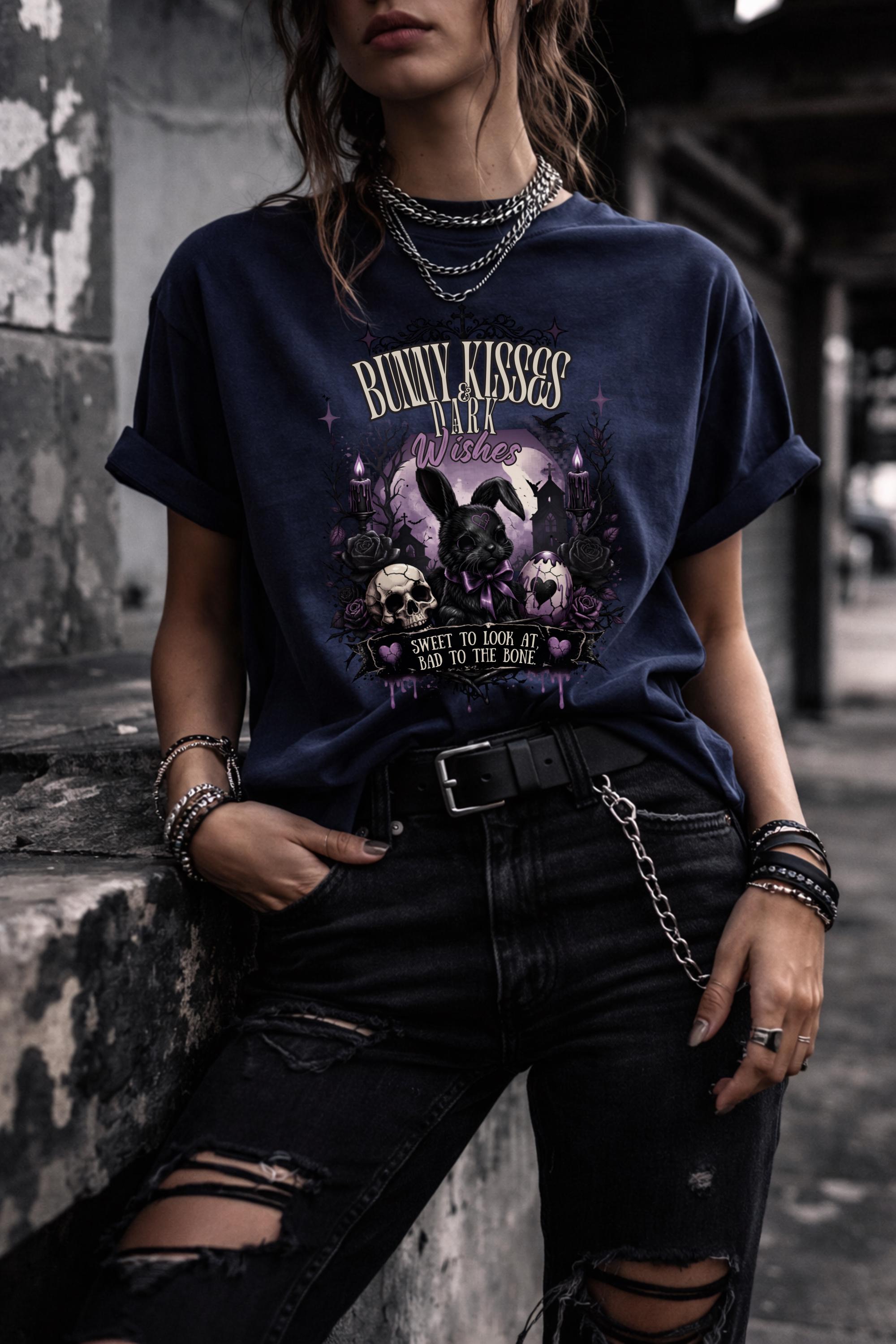 Woman wearing dark gothic bunny graphic t-shirt with text Bunny Kisses Dark Wishes Sweet To Look At Bad To The Bone styled with black jeans