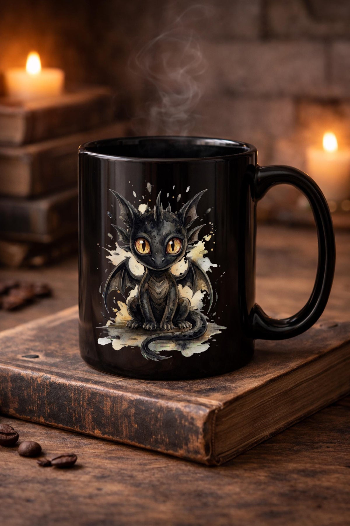 Black ceramic  mug featuring cute watercolor dragon with glowing eyes, styled on rustic wood table with candle, coffee beans, and cozy kitchen background