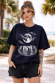 black shirt with dolphin and ocean scene illustration, beach inspired outfit