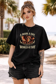 For readers who disappear into stories, dragon reader t-shirt with bookish design, cozy outfit for booktok reader and fantasy lover