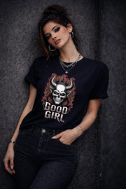 Unisex Comfort Colors t-shirt featuring gothic skull graphic with horns and crown, edgy dark aesthetic design on Midnight shirt worn by model
