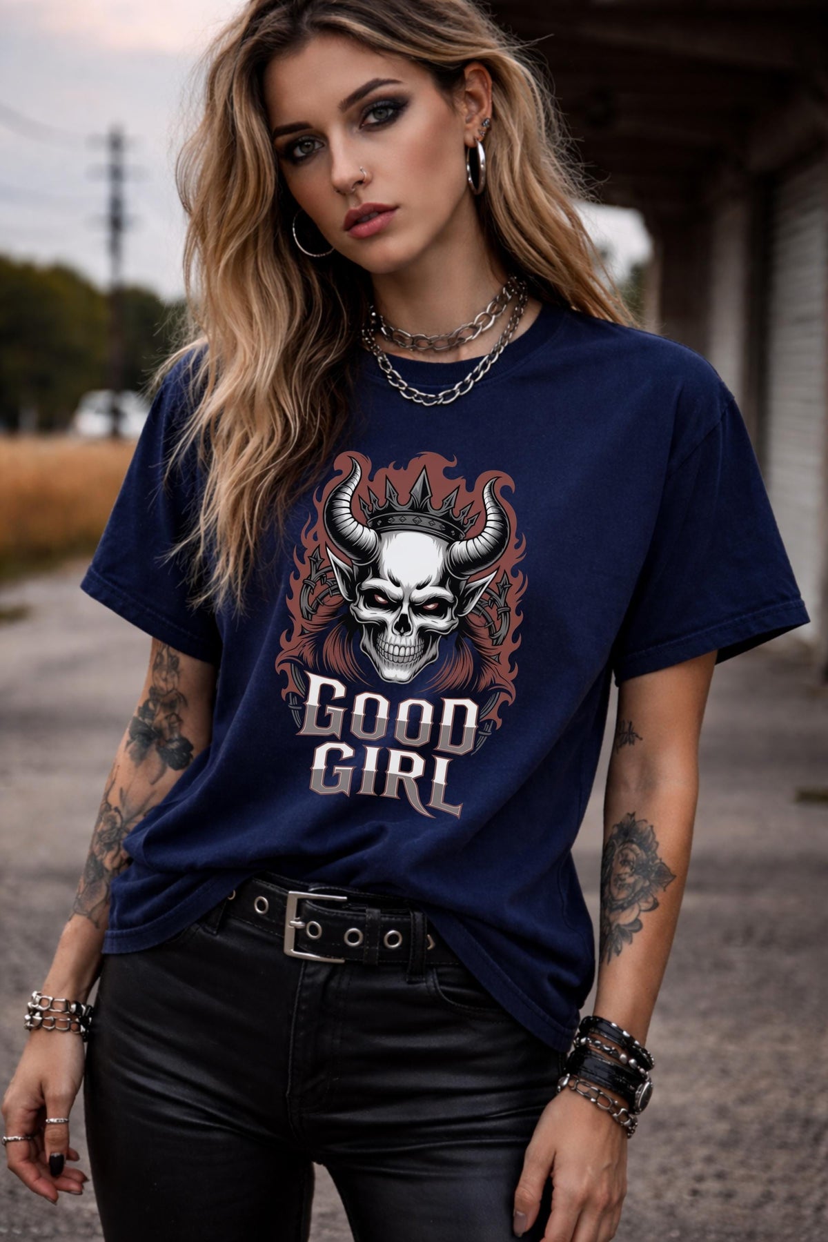 Unisex Comfort Colors t-shirt featuring gothic skull graphic with horns and crown, edgy dark aesthetic design on True Navy shirt worn by model