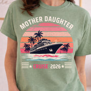 Light green vintage style cruise shirt with Mother Daughter Cruise 2026 design, sunset stripes, palm trees and cruise ship graphic