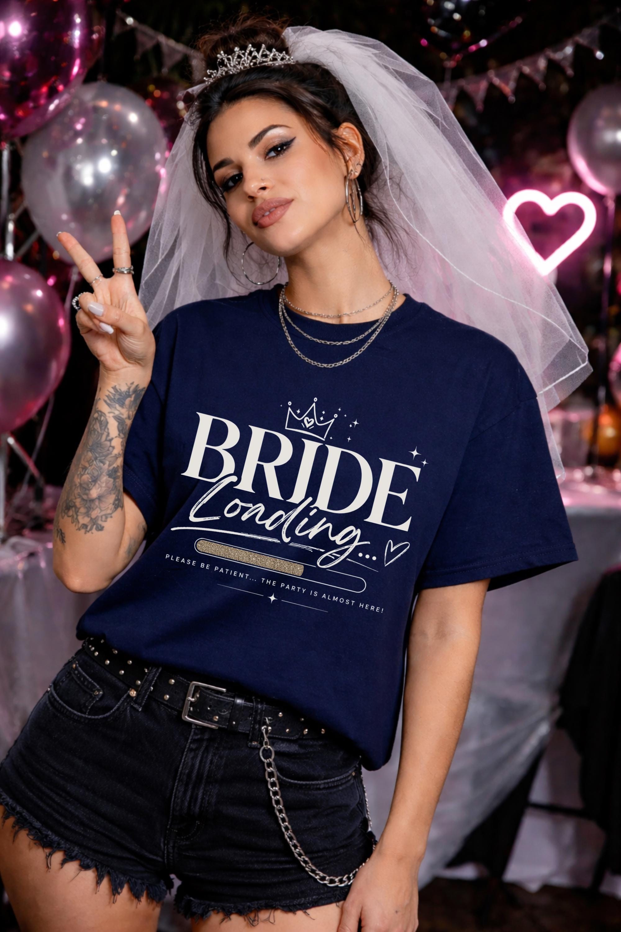 Bride loading bachelorette shirt mockup, woman wearing navy tee with “Bride Loading” text and progress bar design, bridal party outfit with veil and party background