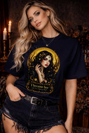 woman wearing Gildan 5000 gothic graphic t shirt with dark feminine celestial design in black aesthetic style