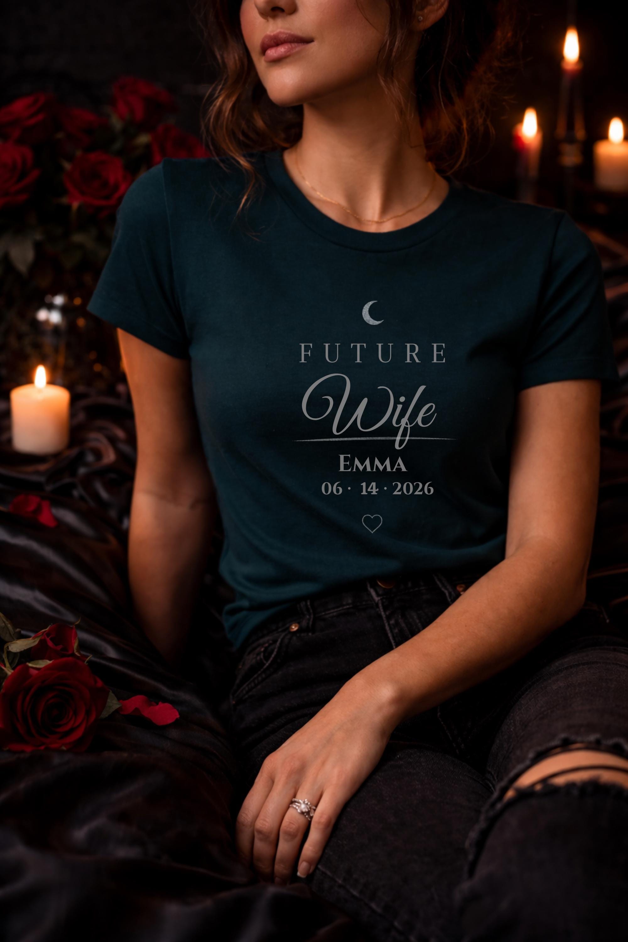 matching future husband and future wife shirts with personalized names and date worn by couple in moody dark romance style