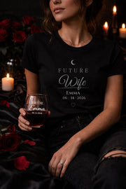 matching future husband and future wife shirts with personalized names and date worn by couple in moody dark romance style