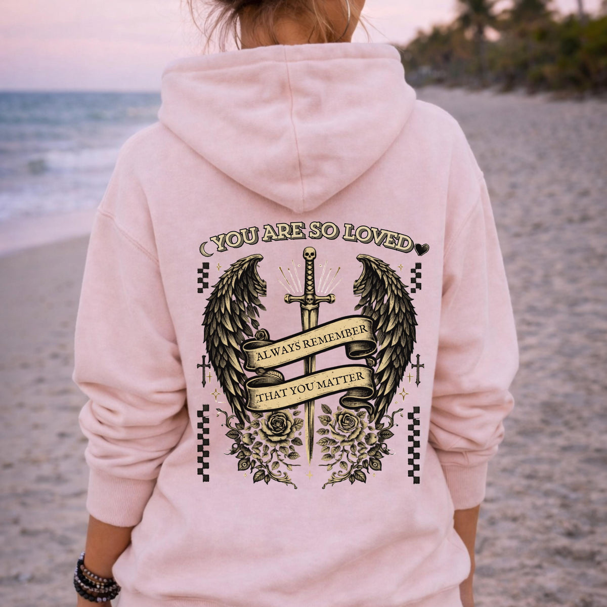 Gothic “You Are So Loved” hoodie with winged dagger and roses back design