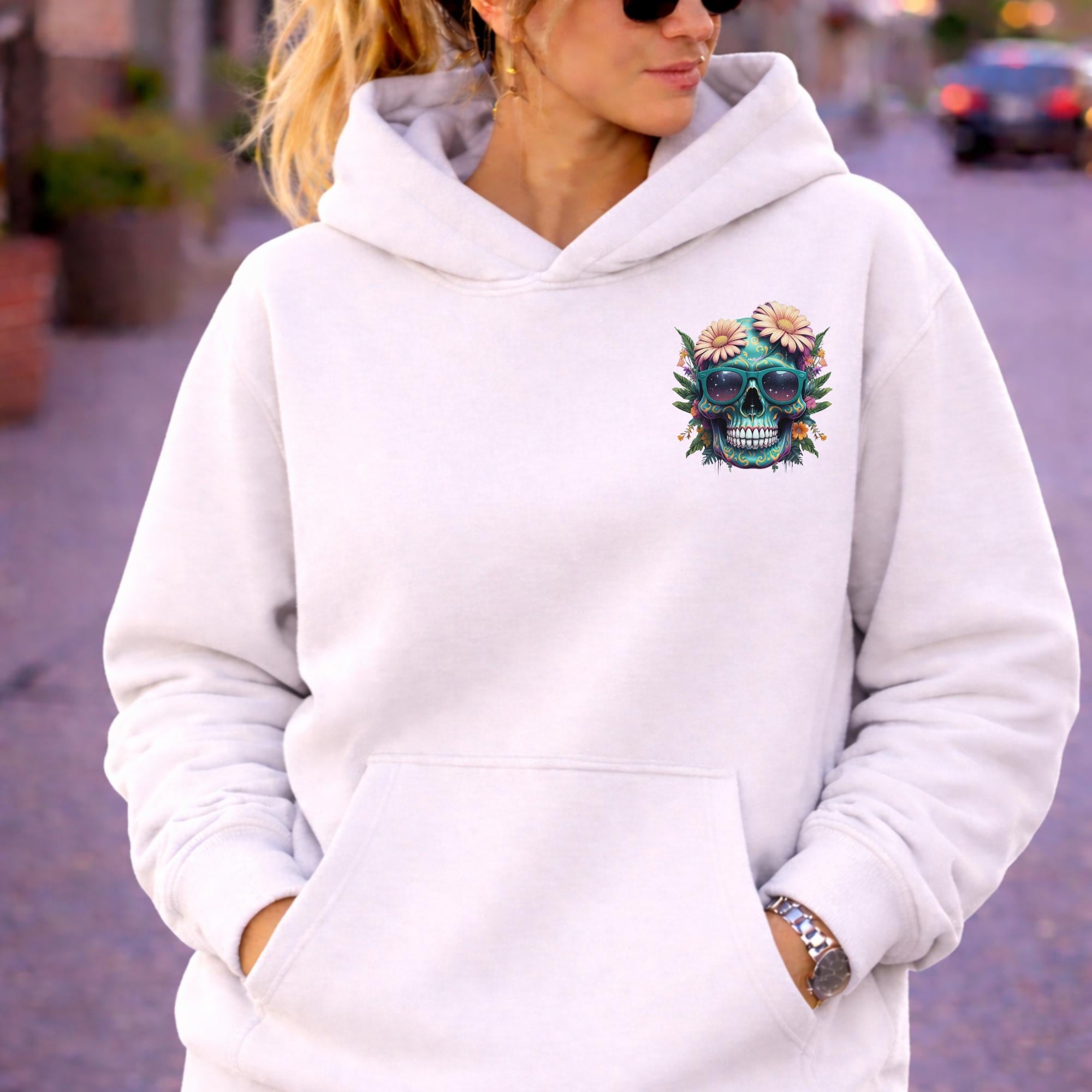 Front view of woman wearing a Premium Pullover Hoodie Cotton Heritage M2580 with a small colorful floral skull with sunglasses design on the chest