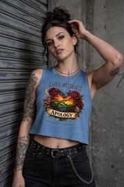 Bella Canvas women’s cropped tank top featuring rainbow heart with roses and “Love Without Apology” text, styled on model with edgy streetwear aesthetic