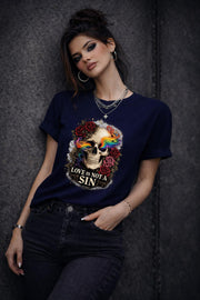 Graphic t-shirt featuring skull with rainbow accents and roses with “Love Is Not a Sin” text, styled on model with edgy alternative streetwear aesthetic