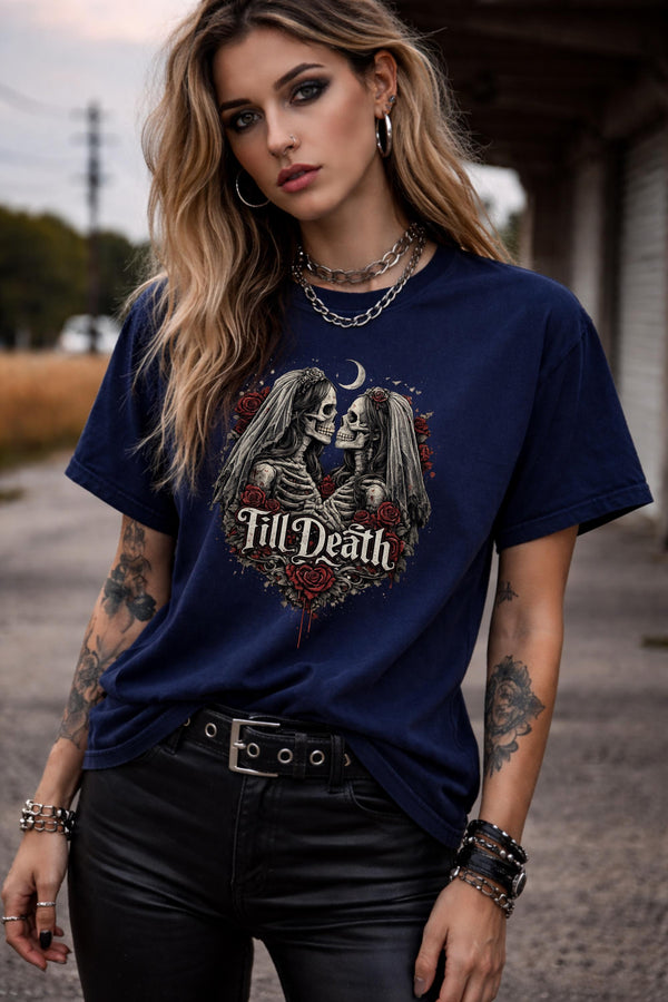 Navy blue gothic graphic t-shirt featuring skeleton bride and groom with roses and “Till Death” text, styled on female model with edgy alternative fashion aesthetic