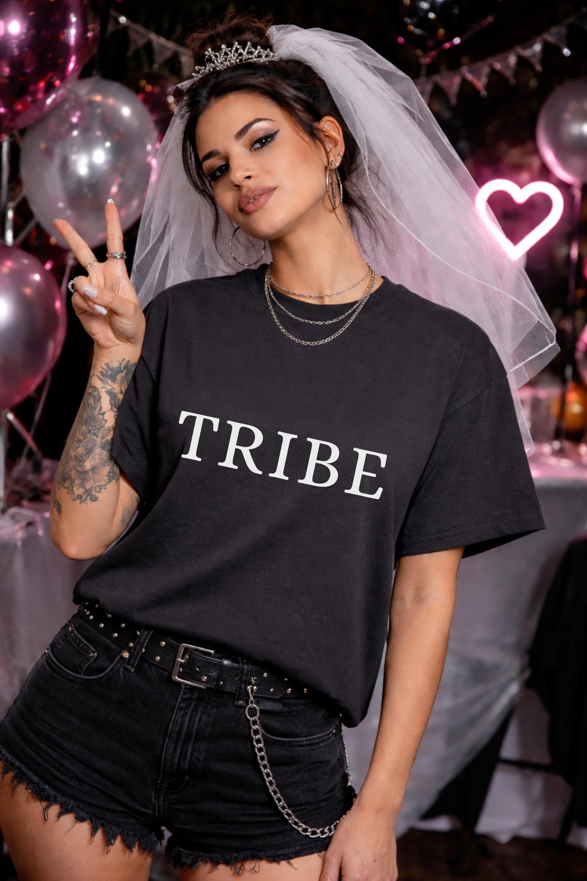 Bridal party tribe shirt, woman wearing black t-shirt with minimalist tribe text, bachelorette party outfit idea