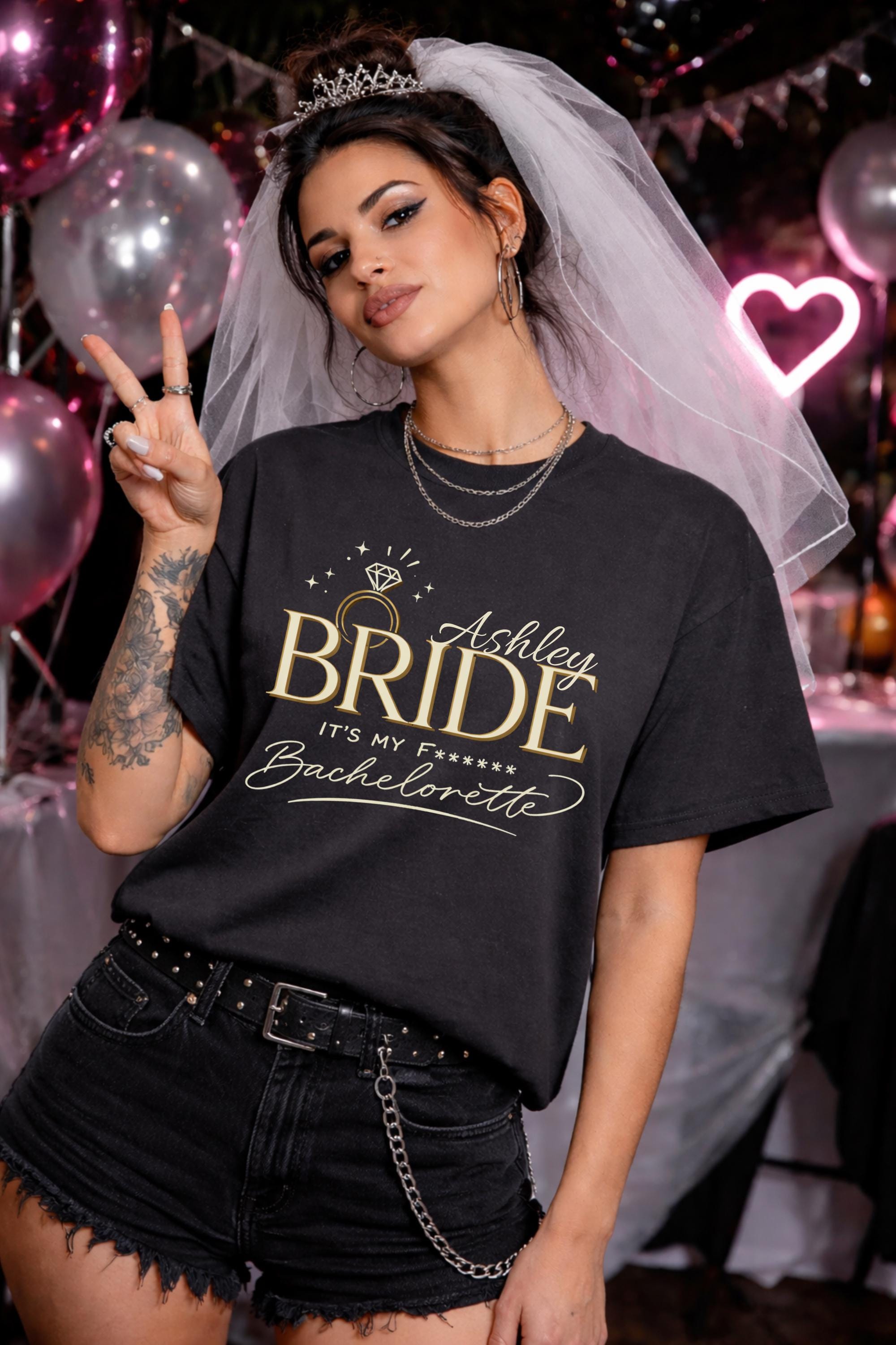 Bride bachelorette shirt mockup, woman wearing black tee with gold “Bride It’s My F****** Bachelorette” design and custom name Ashley, edgy bridal party outfit