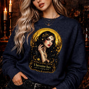 woman wearing black gildan 18000 crewneck sweatshirt with gothic dark feminine celestial design