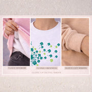 Close-up details of crewneck sweatshirt including soft fleece interior, ribbed neckline, and sleeve cuff fabric texture in pink, white, and sand