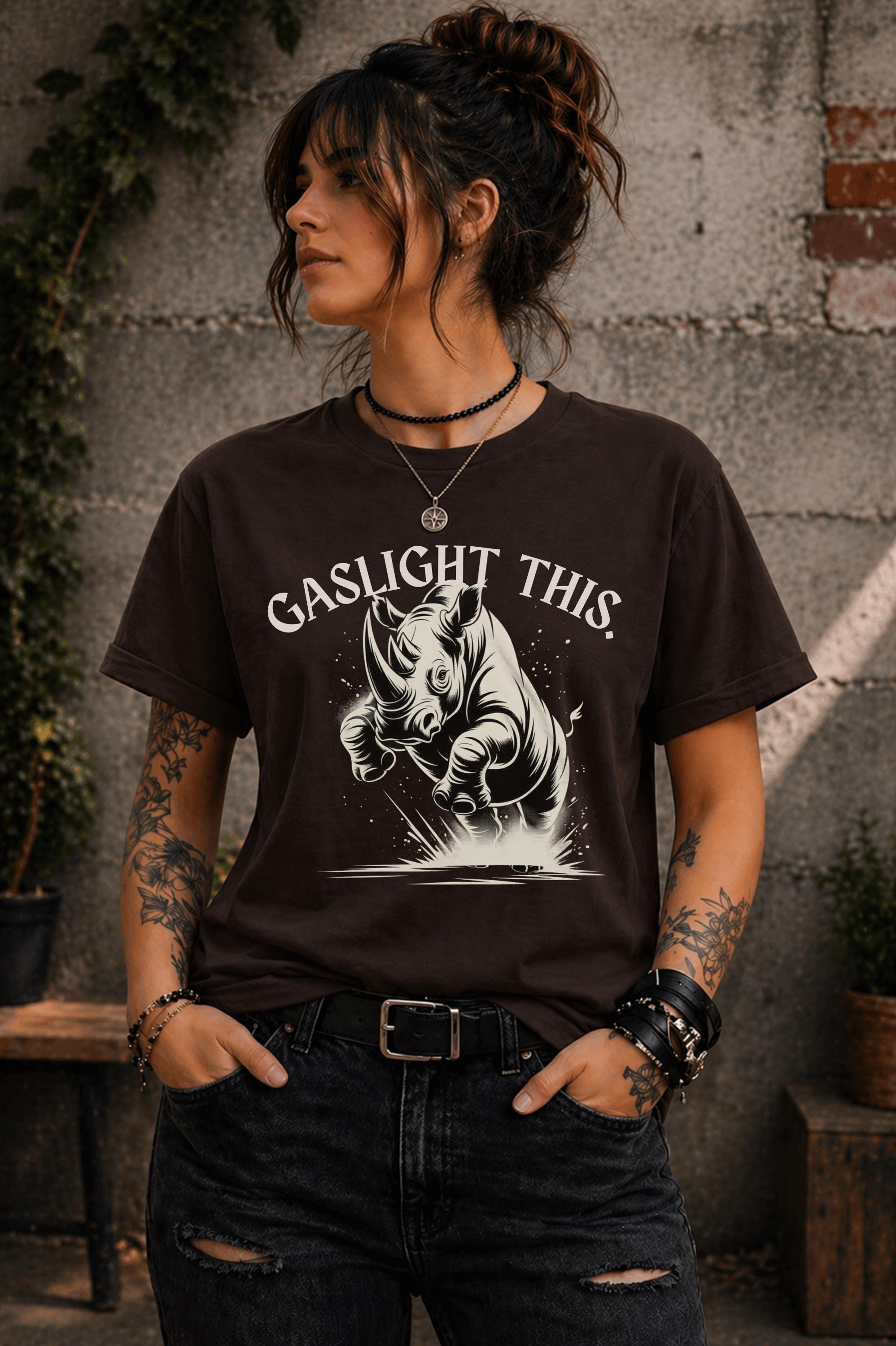 Edgy woman model in ripped jeans wearing funny gaslight this slogan shirt lifestyle mockup