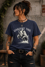 Edgy woman model in ripped jeans wearing funny gaslight this slogan shirt lifestyle mockup