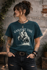 Edgy woman model in ripped jeans wearing funny gaslight this slogan shirt lifestyle mockup