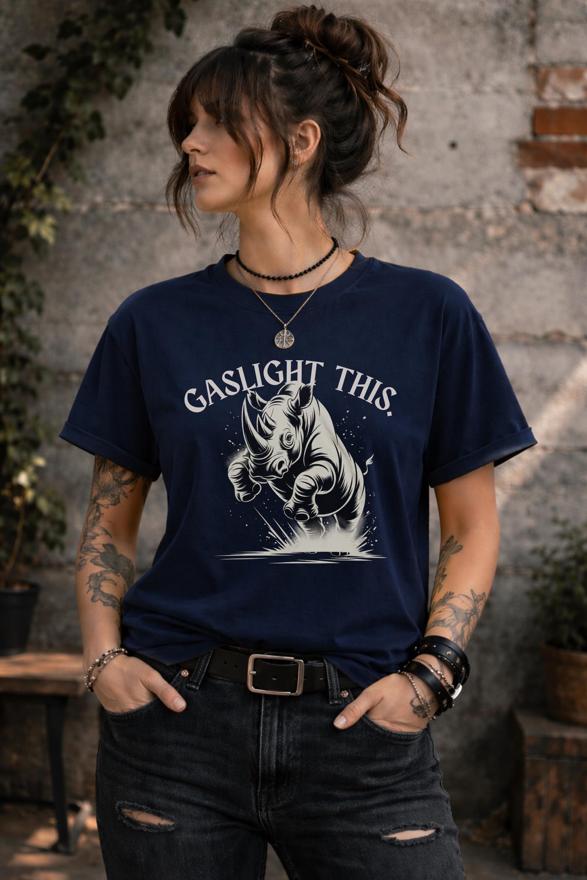 Edgy woman model in ripped jeans wearing funny gaslight this slogan shirt lifestyle mockup