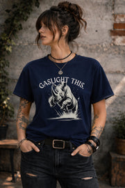 Edgy woman model in ripped jeans wearing funny gaslight this slogan shirt lifestyle mockup