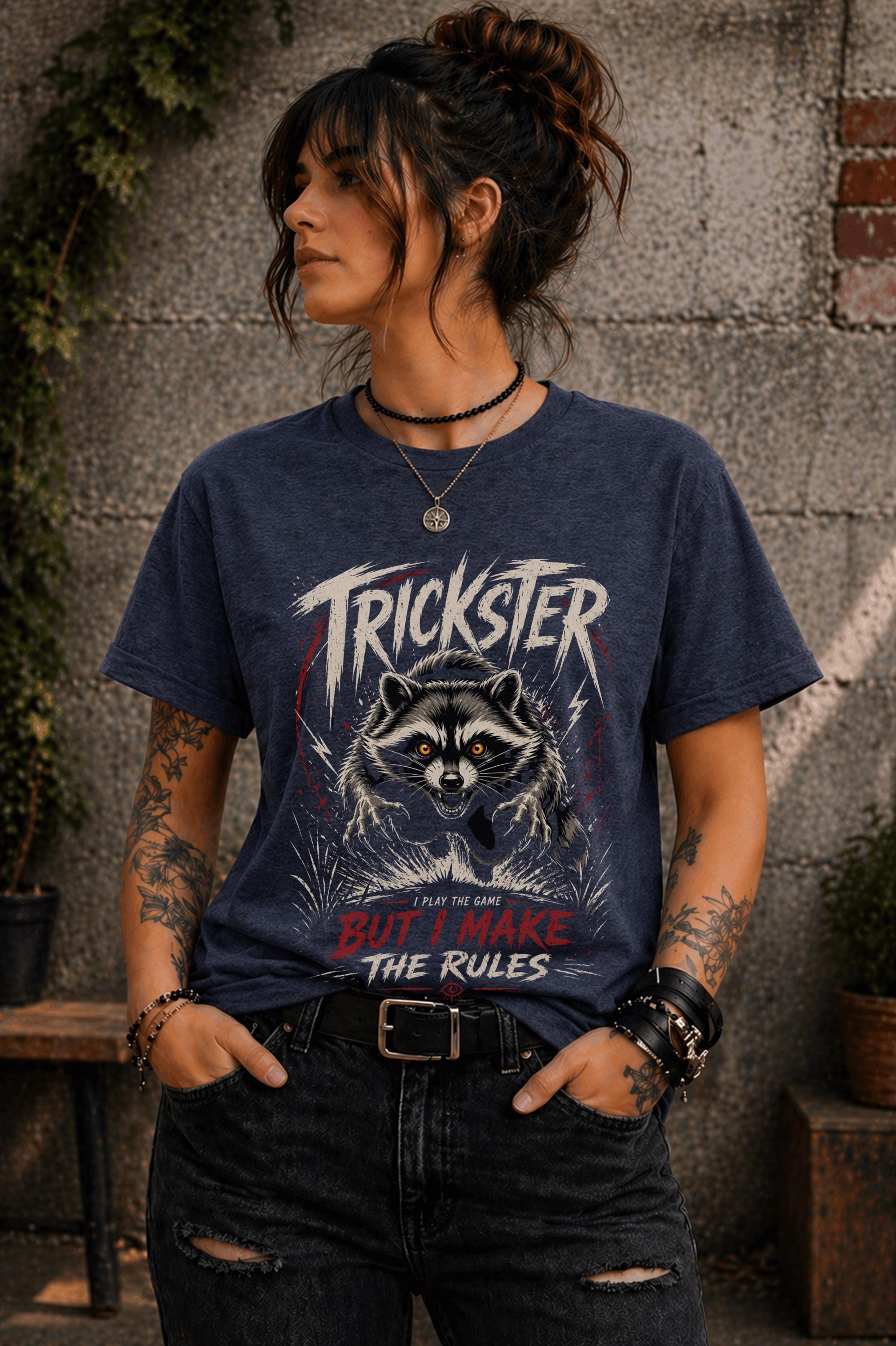 Streetwear style outfit with unisex trickster raccoon graphic tee and ripped jeans