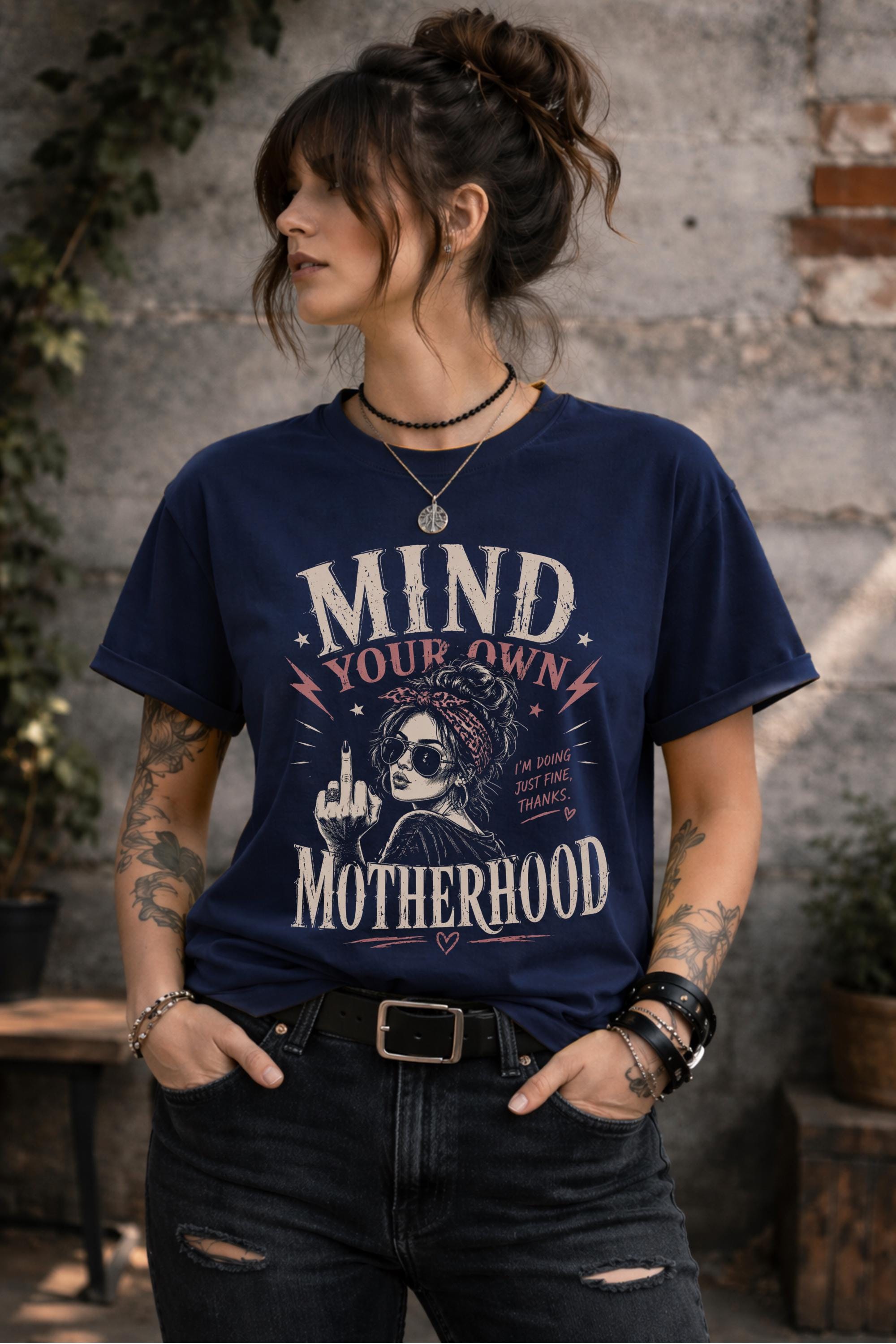 Edgy mom outfit with black graphic tee and ripped jeans lifestyle mockup