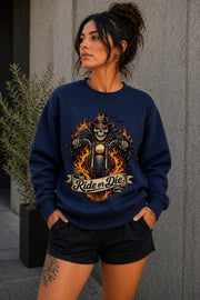 Woman wearing navy biker graphic shirt with skull motorcycle ride or die design