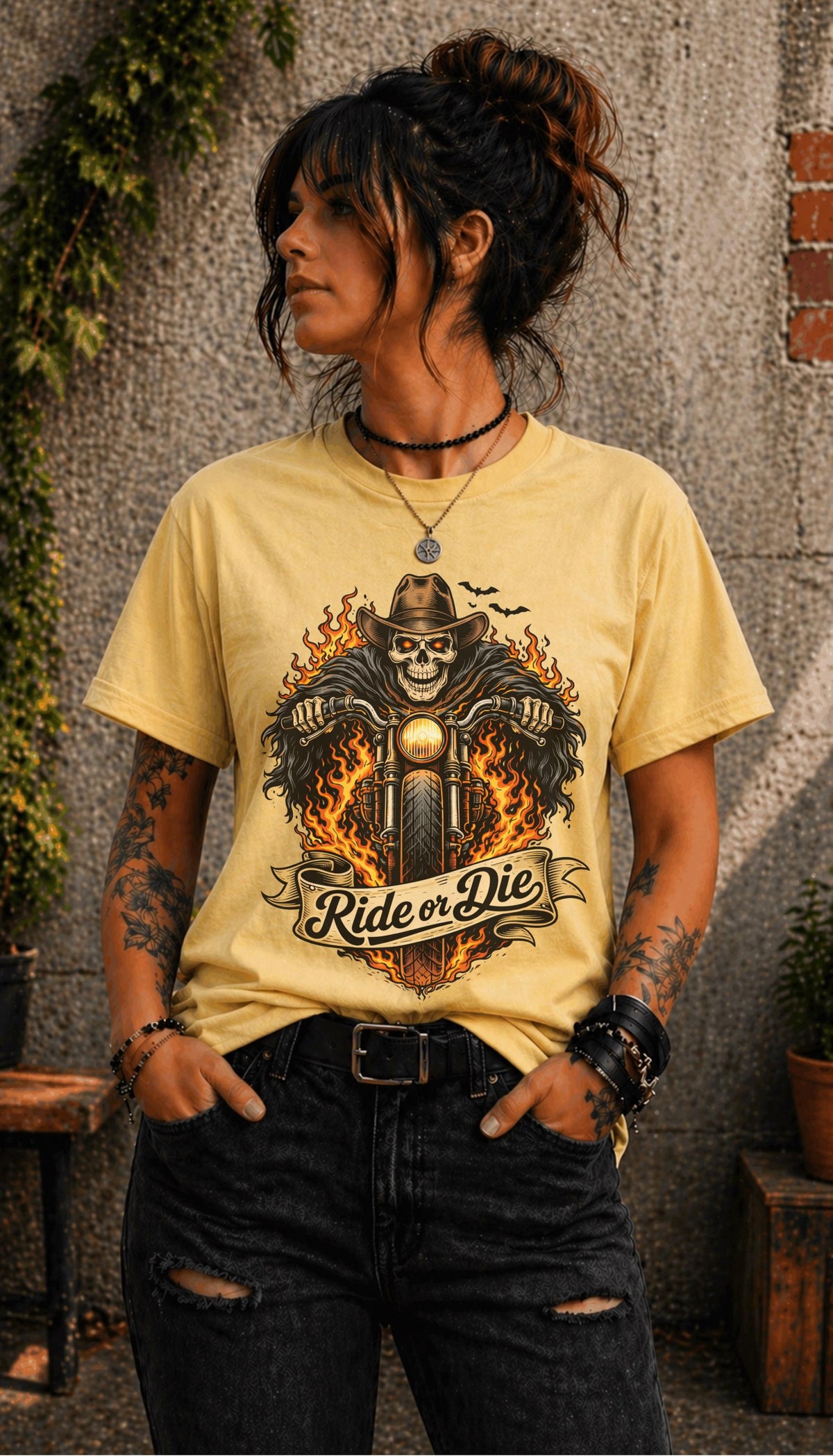 Edgy outfit with motorcycle graphic tee and ripped jeans lifestyle mockup
