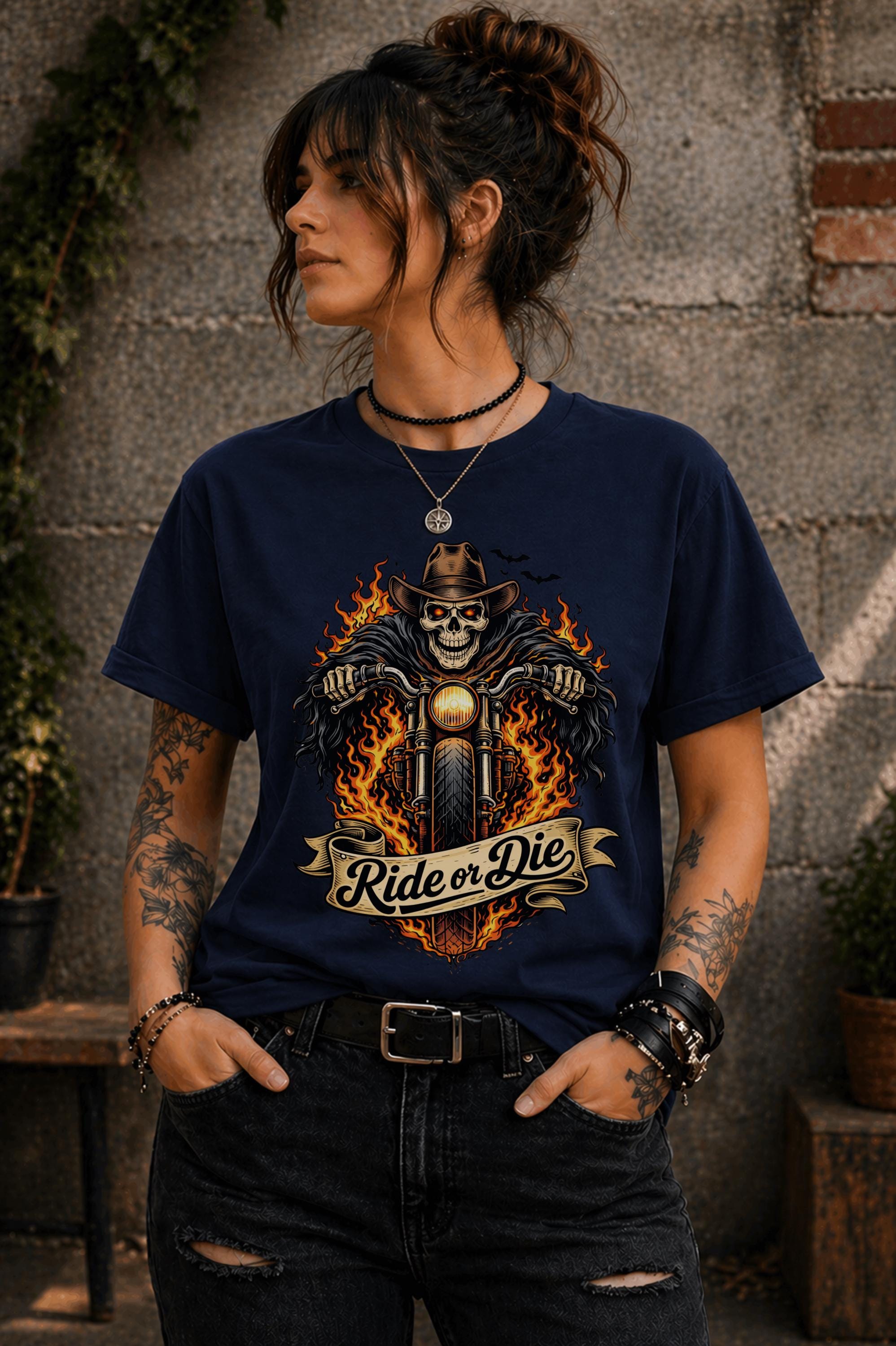 Woman wearing navy biker graphic shirt with skull motorcycle ride or die design