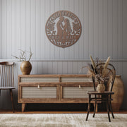 Gothic metal wall decor with til death couple design and custom names displayed above a rustic console with candles and skull accents