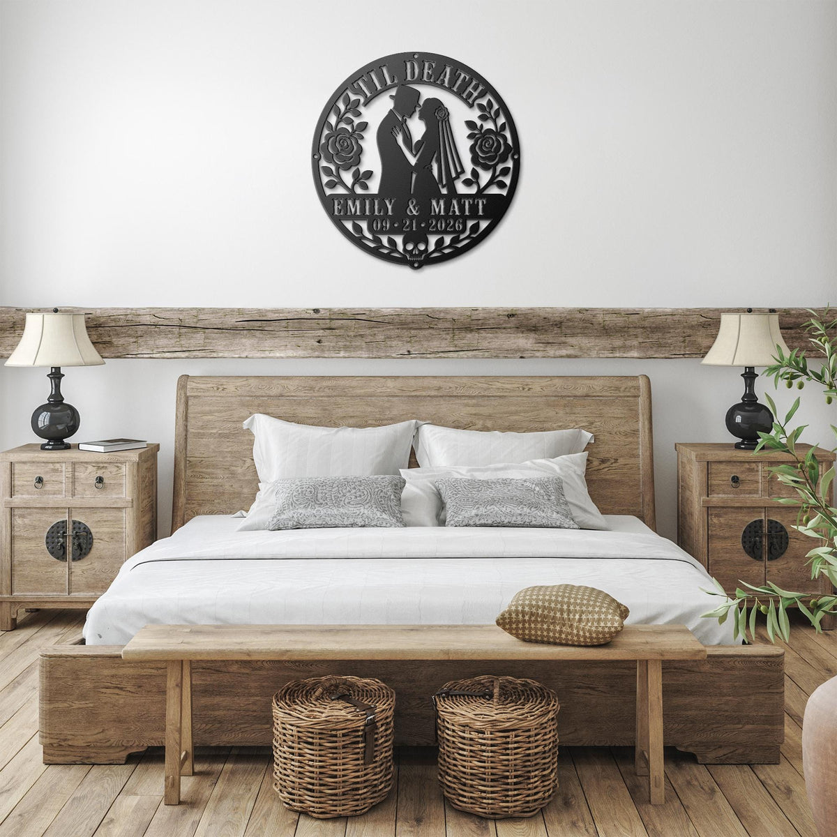 Gothic metal wall decor with til death couple design and custom names displayed above a rustic console with candles and skull accents