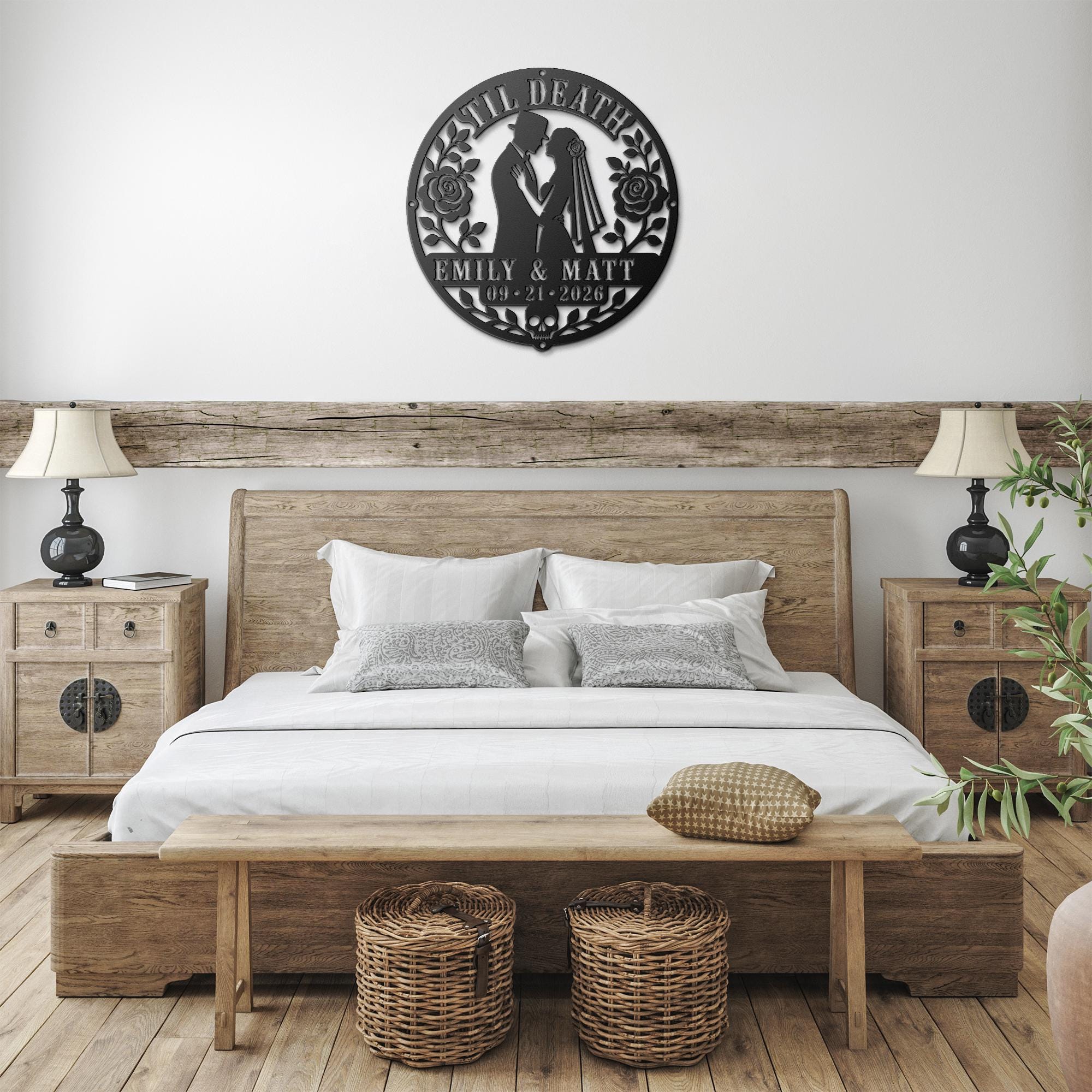 Gothic metal wall decor with til death couple design and custom names displayed above a rustic console with candles and skull accents