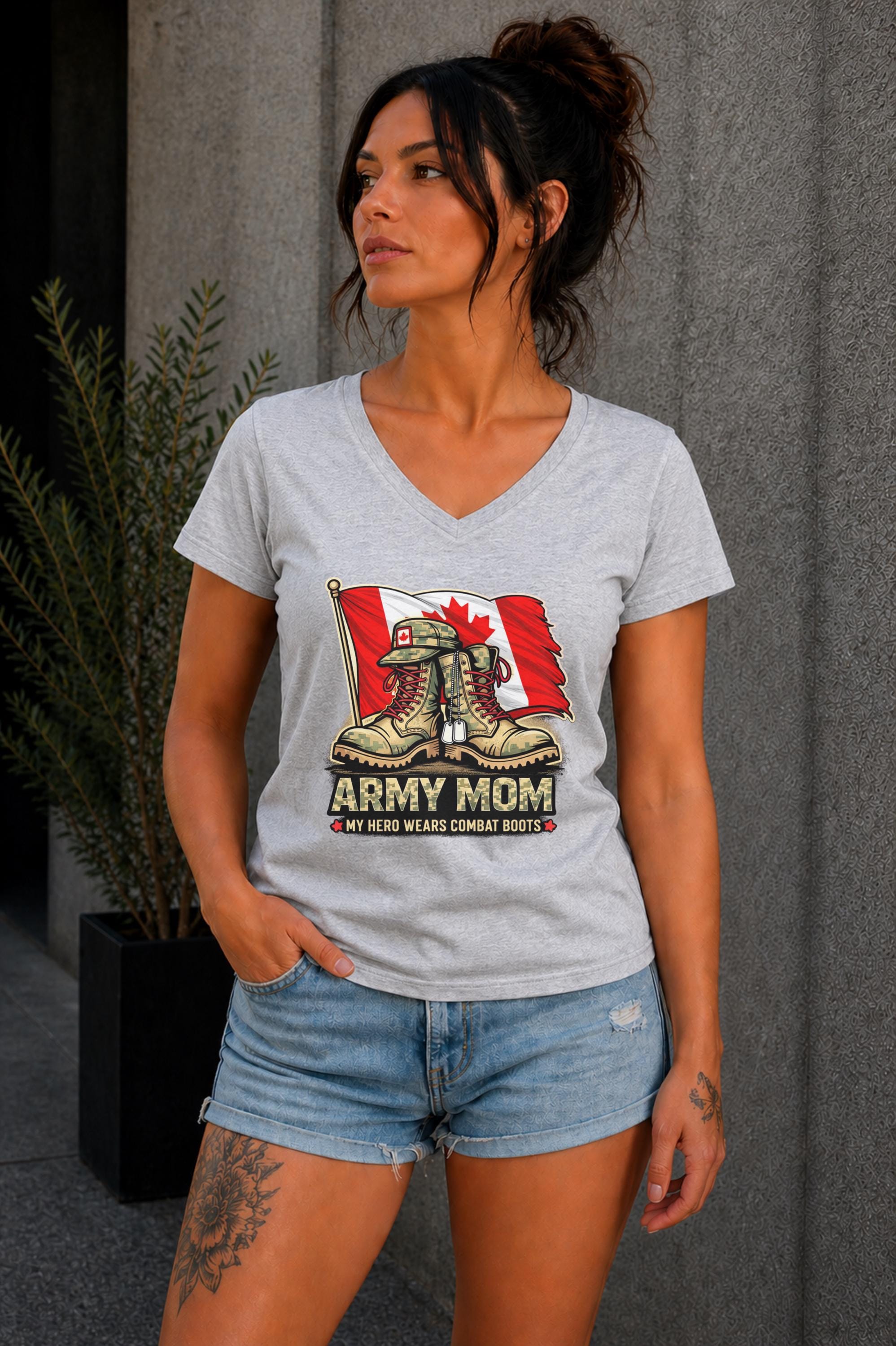 Army Mom graphic tee with military boots and Canada flag design worn outdoors, modern casual fashion look
